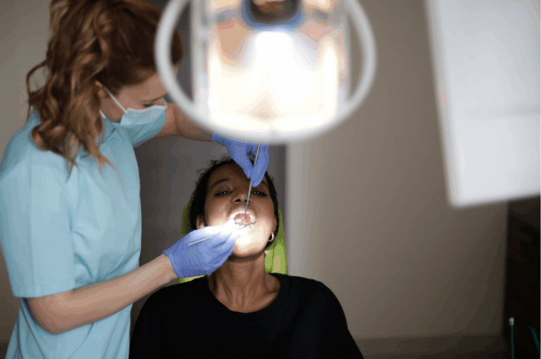 Dental treatment being performed under magnified clinical lighting, Cavity and root canal mitigation and therapy